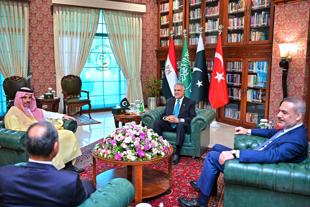 In this photo, released by the Pakistan Ministry of Foreign Affairs, from left, Egyptian Foreign Minister Badr Abdelatty, Saudi Arabia's Foreign Minister Prince Faisal bin Farhan Al-Saud, Pakistan's Foreign Minister Ishaq Dar and Turkish Foreign Minister Hakan Fidan attend a meeting to discuss Middle East war, in Islamabad, Pakistan, Sunday, March 29, 2026. (Pakistan Ministry of Foreign Affairs via AP)