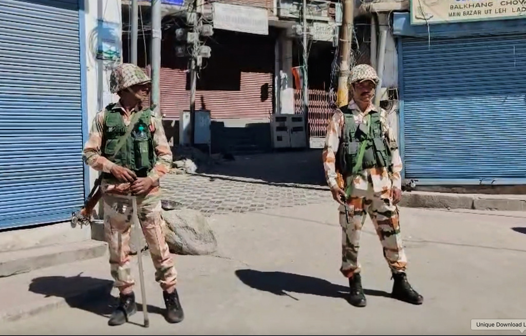 Paramilitary soldiers stand guard a day after protests and violent clashes in Leh town, Ladakh, India, Thursday, Sept. 25, 2025. (AP Photo)