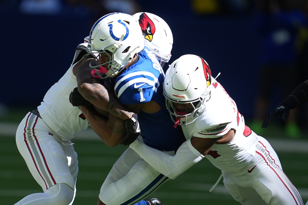 Indianapolis Colts wide receiver Josh Downs (1) runs against Arizona Cardinals safety Jalen Thompson (34) in the first half of an NFL football game, Sunday, Oct. 12, 2025, in Indianapolis, Ind. (AP Photo/Michael Conroy)
