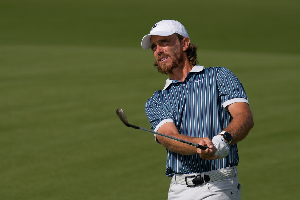 Tommy Fleetwood of England plays his second shot on the 9th hole during the final round of the Abu Dhabi Golf Championship in Abu Dhabi, United Arab Emirates, Sunday, Nov. 9, 2025. (AP Photo/Altaf Qadri)