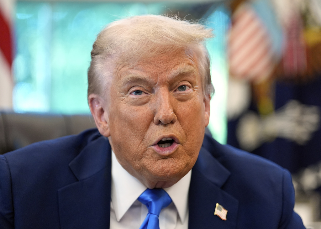President Donald Trump speaks in the Oval Office of the White House, Friday, Sept. 19, 2025, in Washington. (AP Photo/Alex Brandon)