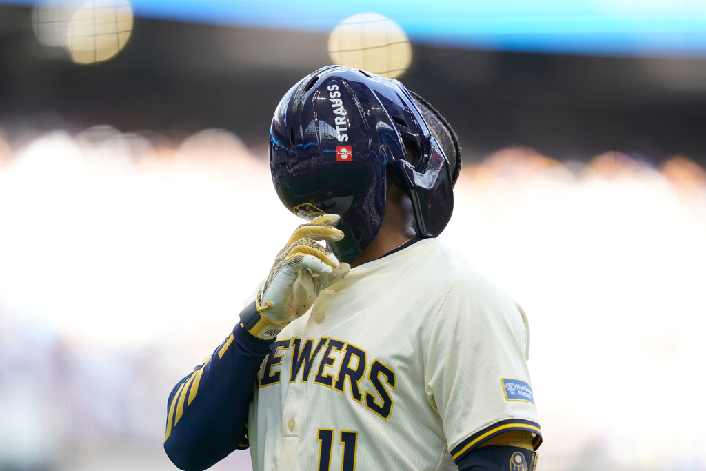 Milwaukee Brewers' Jackson Chourio (11) reacts to leaving the game with an injury during the second inning in Game 1 of baseball's National League Division Series against the Chicago Cubs, Saturday, Oct. 4, 2025, in Milwaukee. (AP Photo/Kayla Wolf)