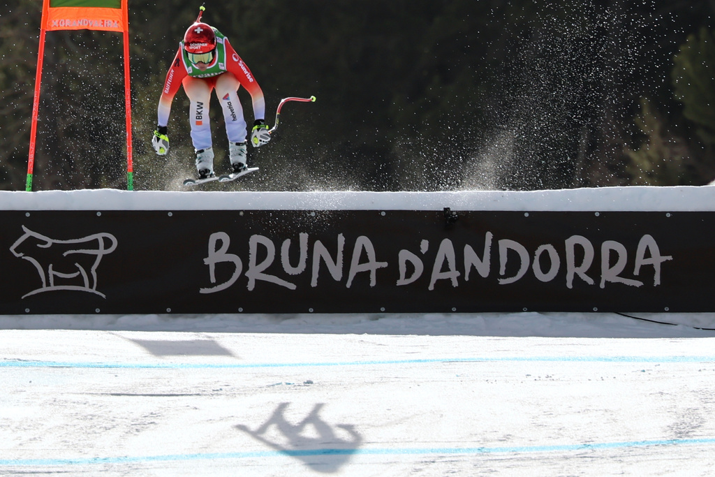 Switzerland's Corinne Suter arrives at the finish area of an alpine ski, women's World Cup downhill, in Soldeu, Andorra, Friday, February. 27, 2026. (AP Photo/Marco Trovati)