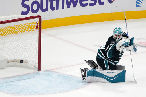 San Jose Sharks goaltender Yaroslav Askarov (30) looks back as the puck goes into the net for a goal by Los Angeles Kings' Brandt Clarke during the third period of an NHL hockey game in San Jose, Calif., Tuesday, Oct. 28, 2025. (AP Photo/Tony Avelar) San Jose Sharks goaltender Yaroslav Askarov (30) looks back as the puck goes into the net for a goal by Los Angeles Kings' Brandt Clarke during the third period of an NHL hockey game in San Jose, Calif., Tuesday, Oct. 28, 2025. (AP Photo/Tony Avelar)