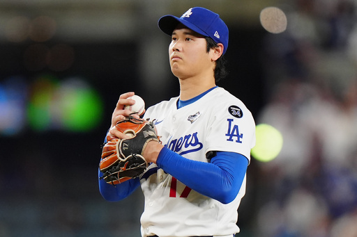 Los Angeles Dodgers pitcher Shohei Ohtani (17) reacts after giving up a double during seventh inning Game 4 World Series playoff MLB baseball action against the Toronto Blue Jays in Los Angeles on Tuesday, Oct. 28, 2025. (Frank Gunn/The Canadian Press via AP) Los Angeles Dodgers pitcher Shohei Ohtani (17) reacts after giving up a double during seventh inning Game 4 World Series playoff MLB baseball action against the Toronto Blue Jays in Los Angeles on Tuesday, Oct. 28, 2025. (Frank Gunn/The Canadian Press via AP)