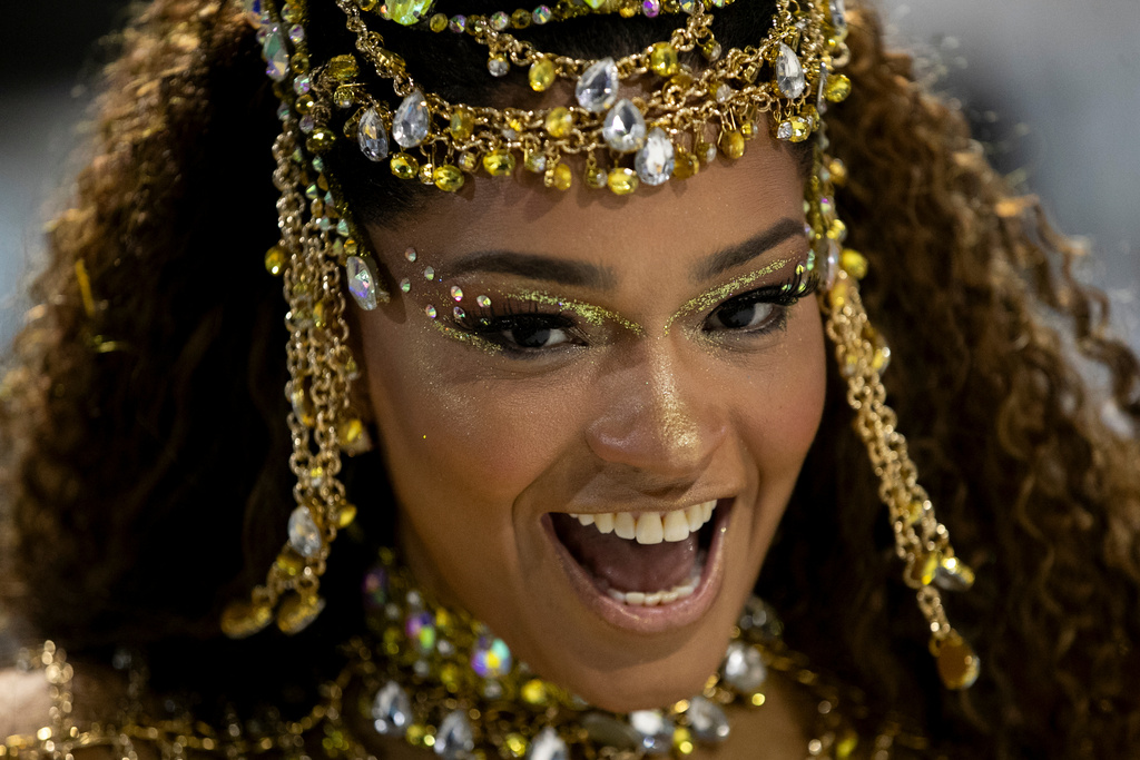 A performer from the Unidos da Tijuca samba school parades during Carnival celebrations at the Sambadrome in Rio de Janeiro, early Tuesday, Feb. 17, 2026. (AP Photo/Bruna Prado)