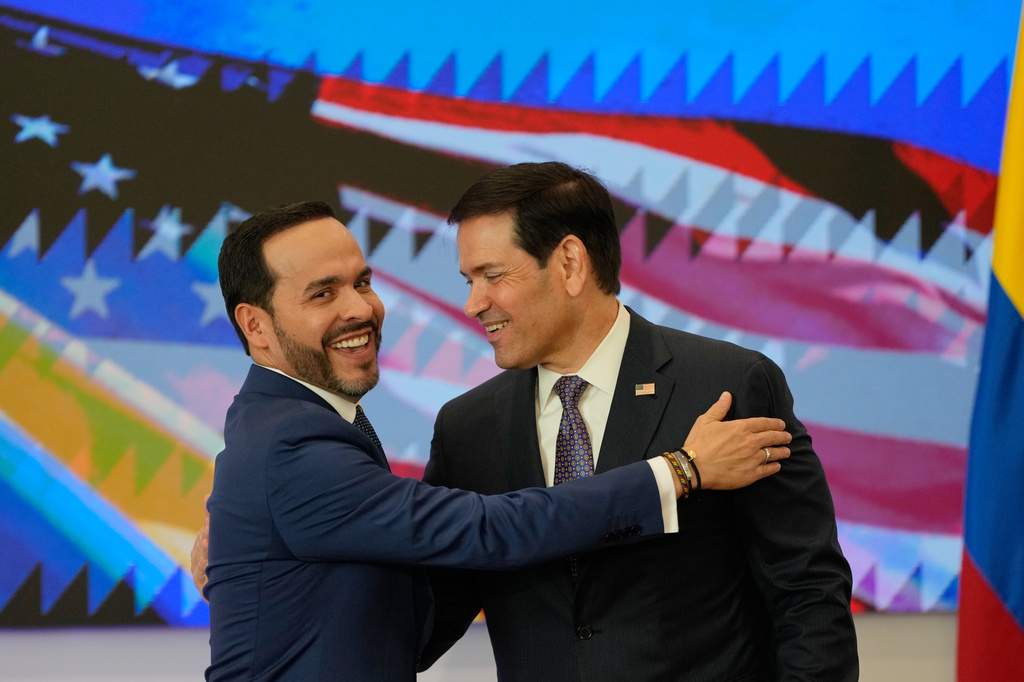 Colombian President Abelardo De La Espriella, left, and U.S. Secretary of State Marco Rubio embrace during a bilateral agreements signing ceremony in Barranquilla, Colombia, Tuesday, Sept. 8, 2026. (AP Photo/Fernando Vergara, Pool)