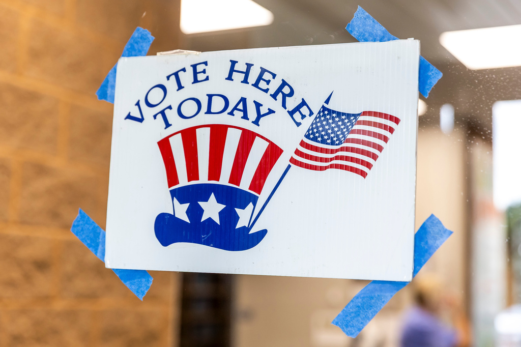 Michigan residents turn out to vote in the midterm elections at Brookside Christian Reformed Church in Grand Rapids, Mich., on Tuesday, Aug. 4, 2026. (Isaac Ritchey/The Grand Rapids Press via AP)
