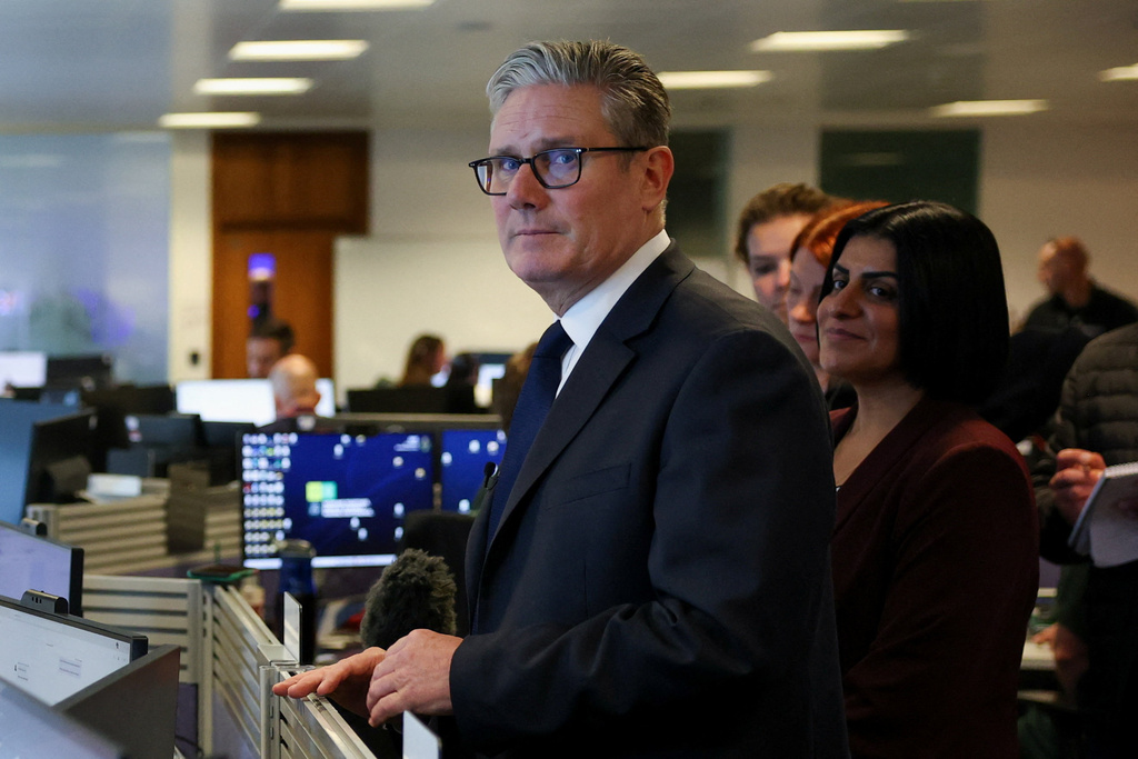 Britain's Prime Minister Keir Starmer and Home Secretary Shabana Mahmood visit the Greater Manchester Police headquarters in Manchester, England, Friday, Oct. 3, 2025, after multiple people were killed Thursday on Yom Kippur in what police have declared a terrorist incident. (Phil Noble/Pool Photo via AP)