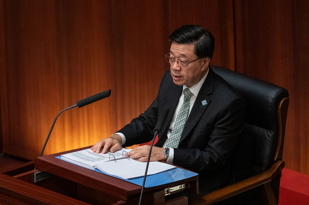 Hong Kong's Chief Executive John Lee delivers the first Five-Year Plan and policy address at the Legislative Council in Hong Kong, Wednesday, Sept. 16, 2026. (AP Photo/Chan Long Hei)