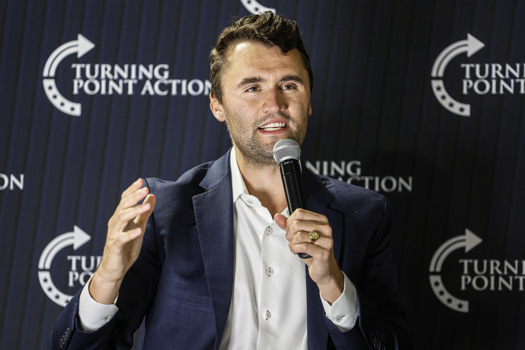 FILE - Charlie Kirk speaks during a town hall meeting on March 17, 2025, in Oconomowoc, Wis. (AP Photo/Jeffrey Phelps, File)