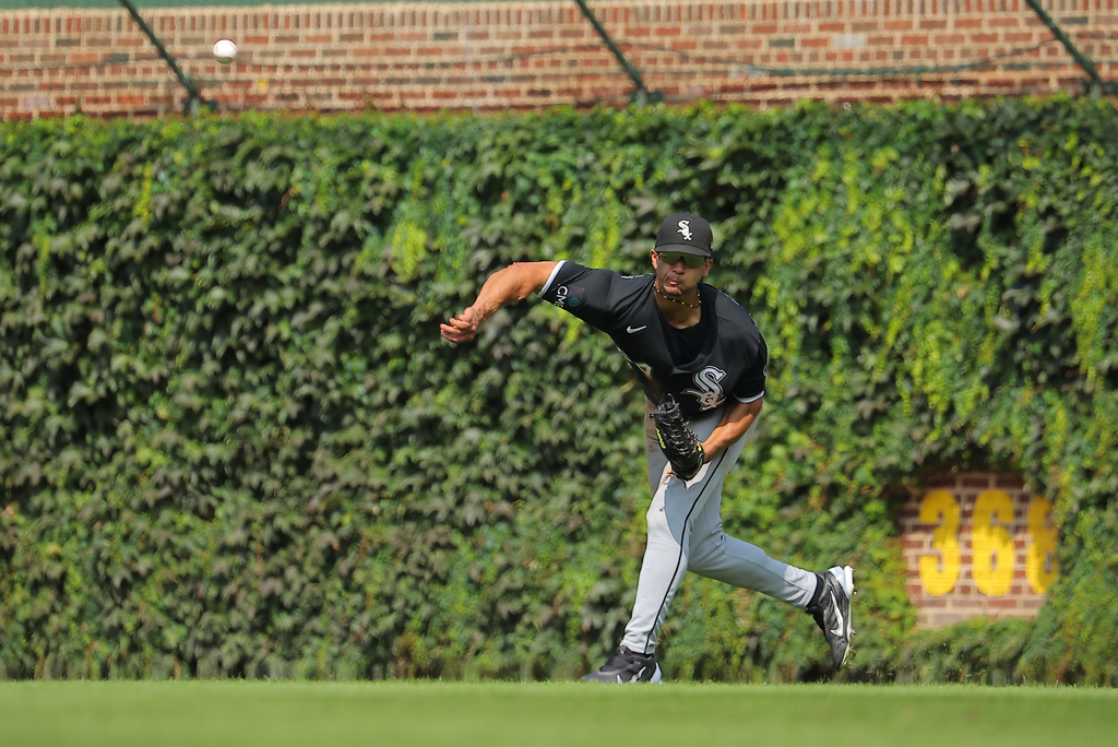 Chicago White Sox's Braden Montgomery throws the ball to third base during the sixth inning of a baseball game against the Chicago Cubs, Wednesday, Aug. 19, 2026, in Chicago. (AP Photo/Melissa Tamez)