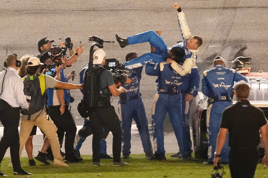 Ryan Preece, center, celebrates with his crew after winning a NASCAR Cup Series auto race at Daytona International Speedway, Saturday, Aug. 29, 2026, in Daytona Beach, Fla. (AP Photo/John Raoux)