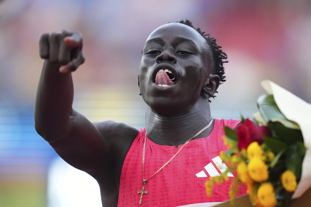 FILE - Gout Gout, of Australia, celebrates after winning the men 200 meters during the Ostrava Golden Spike athletics meet in Ostrava, Czech Republic, on June 24, 2025. (AP Photo/Petr David Josek, File)