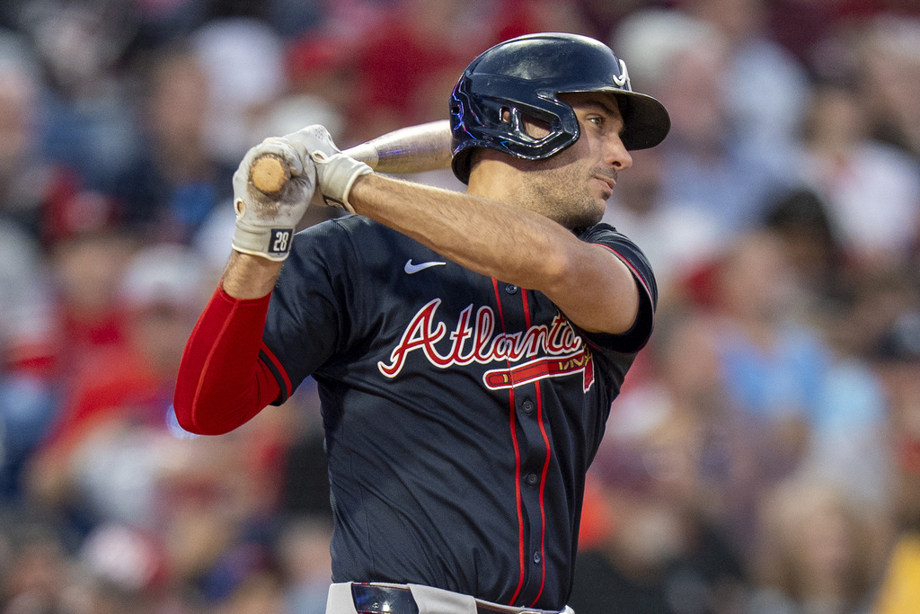 Atlanta Braves' Matt Olson hits a double scoring Jurickson Profar during the sixth inning of a baseball game against the Philadelphia Phillies, Saturday, Aug. 30, 2025, in Philadelphia. (AP Photo/Chris Szagola)