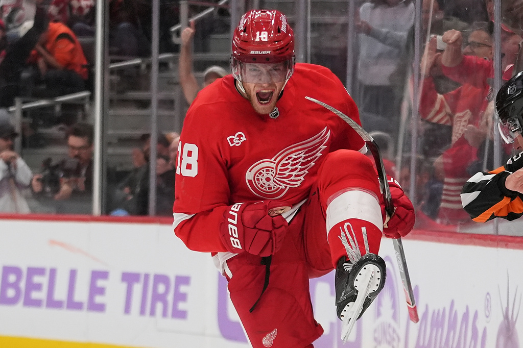Detroit Red Wings center Andrew Copp (18) celebrates his goal against the Philadelphia Flyers in the third period of an NHL hockey game Thursday, Oct. 15, 2026, in Detroit. (AP Photo/Paul Sancya)