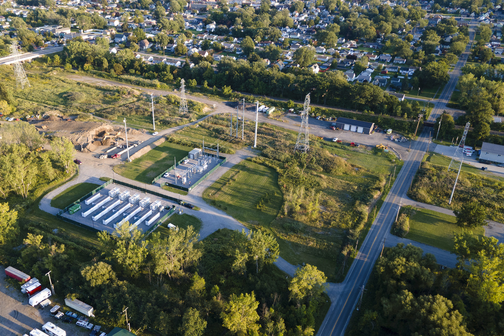 A large lithium battery energy storage system, center lower left, operated by Key Capture Energy is shown in Blasdell, N.Y., Monday, Sept. 8, 2025. (AP Photo/Ted Shaffrey)