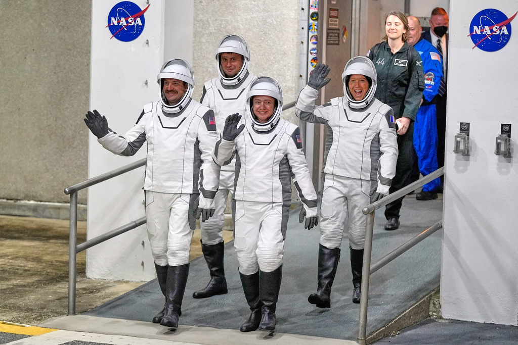 Crew 12 astronauts, from left, pilot Jack Hathaway, Russian cosmonaut Andrei Fedyaev, commander Jessica Meir and ESA astronaut Sophia Adenot, of France, leave the Operations and Checkout building before heading to pad 40 at the Cape Canaveral Space Force Station in Cape Canaveral, Fla., Friday, Feb. 13, 2026, on a mission to the International Space Station. (AP Photo/John Raoux)