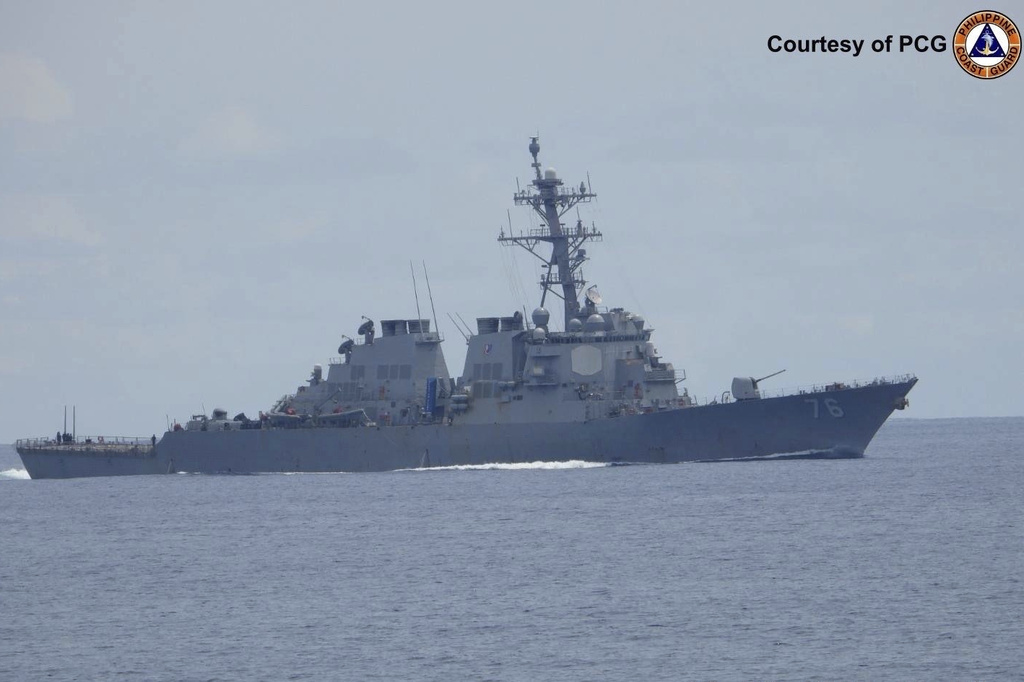 In this photo, provided by the Philippine Coast Guard, United States Navy USS Higgins (DDG 76) conduct freedom of navigation operations (FONOP) at the South China Sea on Wednesday Aug. 13, 2025. (Philippine Coast Guard via AP)