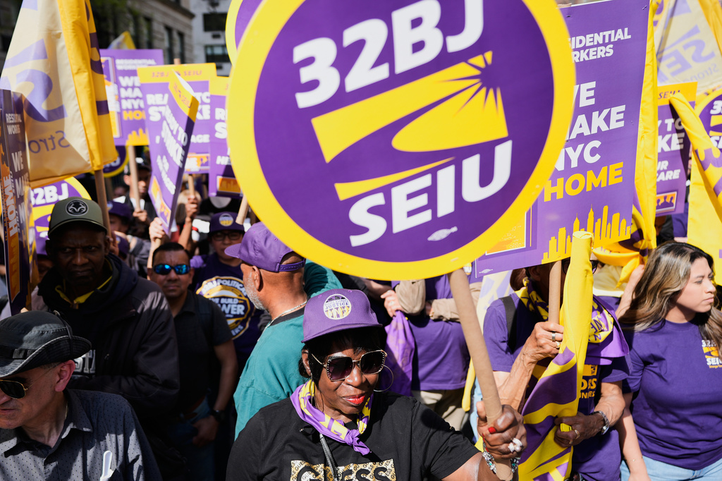 Members of the 32BJ SEIU union and their supporters rally on Park Avenue, in New York, Wednesday, April 15, 2026. (AP Photo/Seth Wenig)
