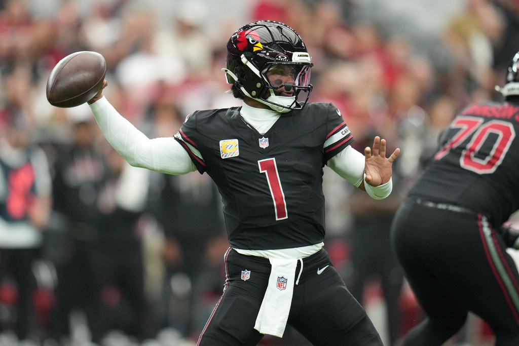 FILE - Arizona Cardinals quarterback Kyler Murray (1) throws a pass during the first half of an NFL football game against the Tennessee Titans, Oct. 5, 2025, in Glendale, Ariz. (AP Photo/Rick Scuteri, File)