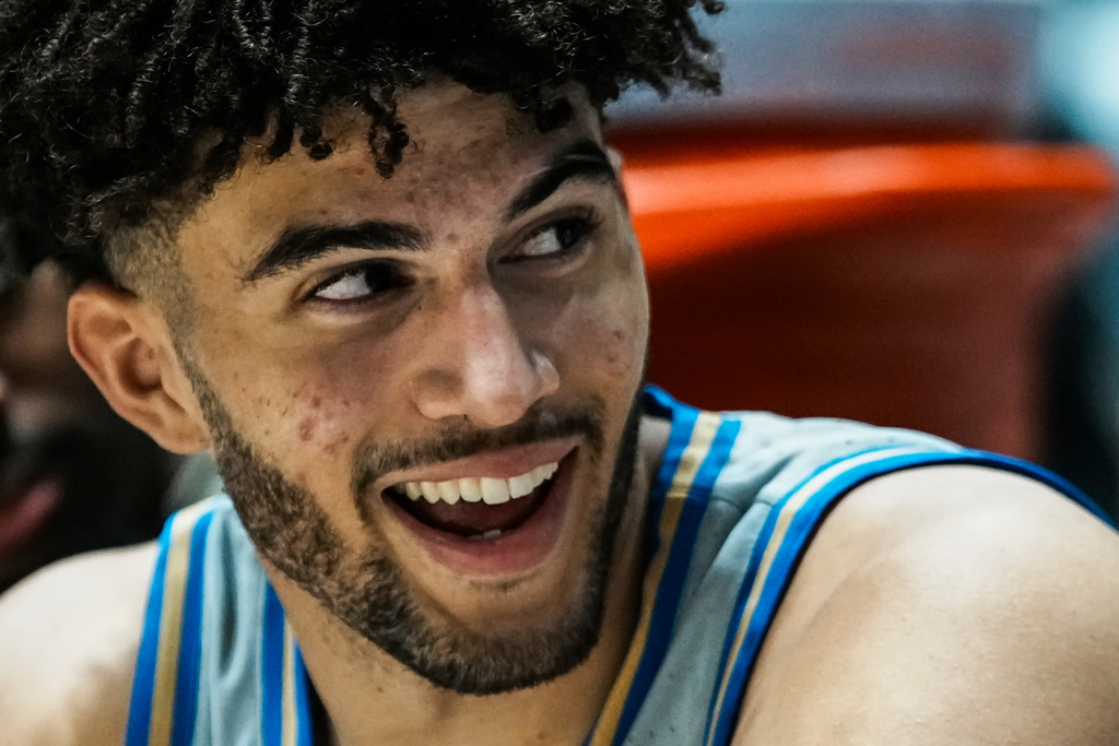 Duke's Cameron Boozer (12) smiles in the bench during the second half of an NCAA college basketball game against the Army, Tuesday, Nov. 11, 2025, in West Point. N.Y. (AP Photo/Eduardo Munoz Alvarez)