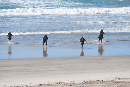 Marines perform a demonstration as Vice President JD Vance, not pictured, watches to mark the upcoming Marine Corps' 250th anniversary Saturday, Oct 18, 2025, on Marine Corps Base Camp Pendleton in Camp Pendleton, Calif. (AP Photo/Gregory Bull) Marines perform a demonstration as Vice President JD Vance, not pictured, watches to mark the upcoming Marine Corps' 250th anniversary Saturday, Oct 18, 2025, on Marine Corps Base Camp Pendleton in Camp Pendleton, Calif. (AP Photo/Gregory Bull)