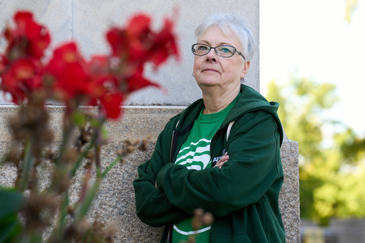 Sue Conard, 75, of Wisc., poses for a portrait on Capitol Hill, Thursday, Oct. 9, 2025, in Washington. (AP Photo/Jacquelyn Martin) Sue Conard, 75, of Wisc., poses for a portrait on Capitol Hill, Thursday, Oct. 9, 2025, in Washington. (AP Photo/Jacquelyn Martin)