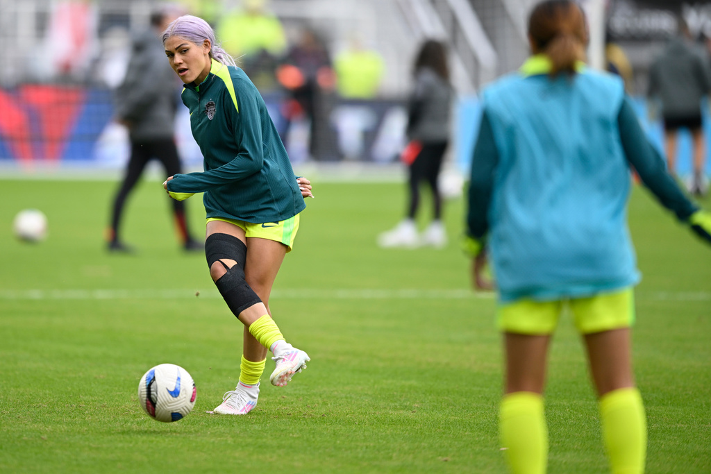 Washington Spirit forward Trinity Rodman warms up before a NWSL semifinal women's soccer match against Portland Thorns FC, Saturday, Nov. 15, 2025, in Washington. (AP Photo/John McDonnell)