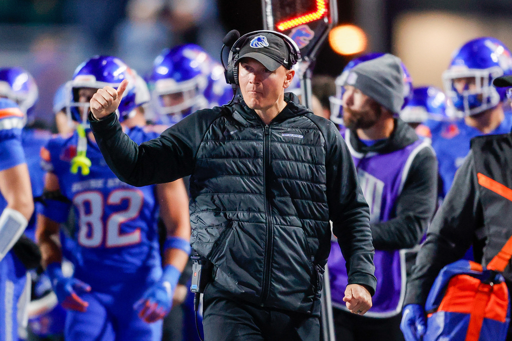 FILE - Boise State head coach Spencer Danielson gives a thumbs up to his offense against New Mexico in the second half of an NCAA college football game, Oct. 11, 2025, in Boise, Idaho. (AP Photo/Steve Conner, File)