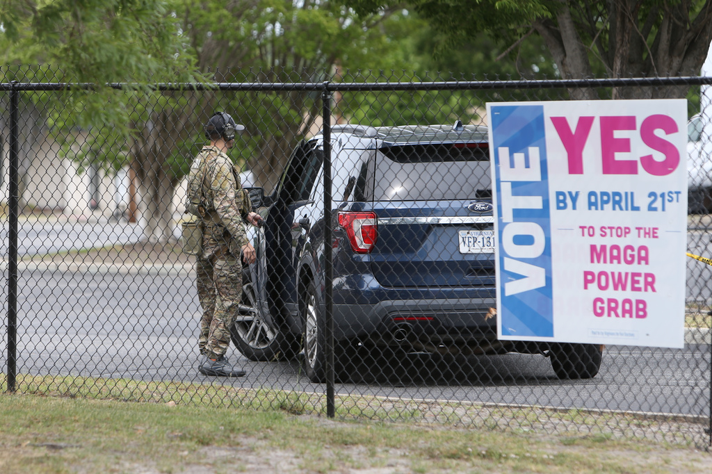 FBI personnel enter a building in Portsmouth, Va., Wednesday, May 6, 2026. (AP Photo/John Clark)
