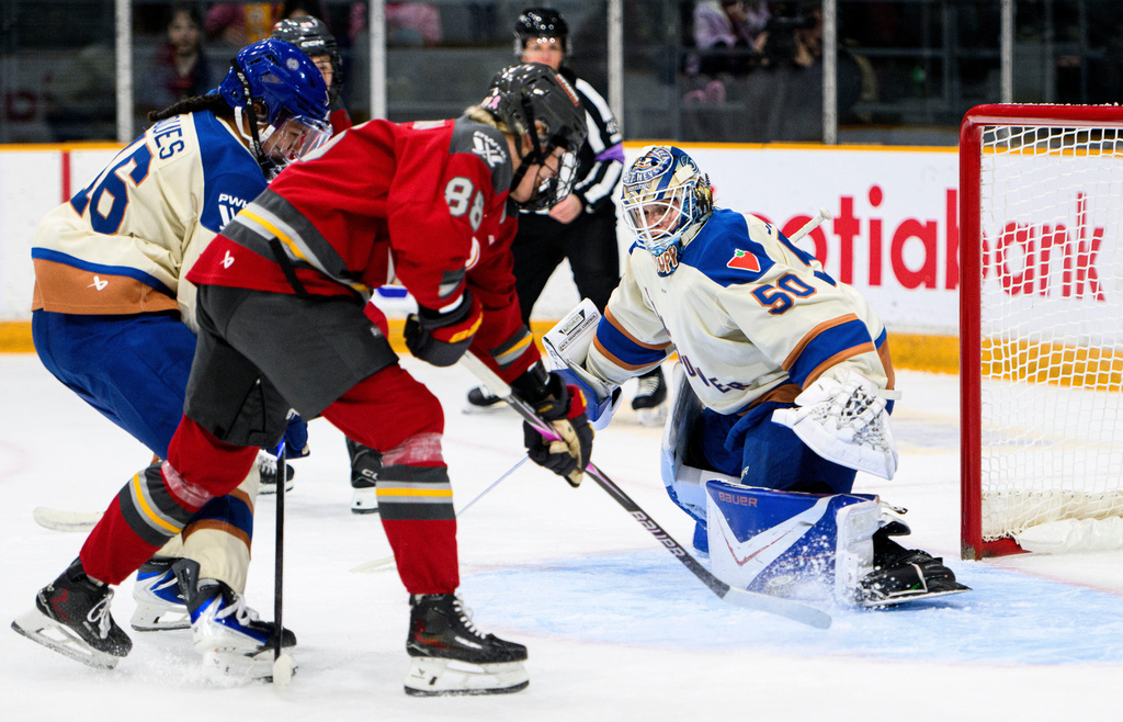 Ottawa Charge's Ronja Savolainen (88) scores against Vancouver Goldeneyes goaltender Kristen Campbell (50) during first-period PWHL hockey game action in Ottawa, Ontario, Friday, Jan. 9, 2026. (Spencer Colby/The Canadian Press via AP)