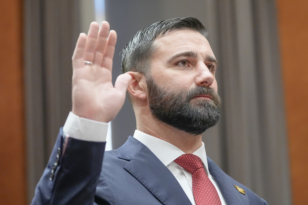 Cameron Hamilton sworn during a Senate Committee on Homeland Security and Government Affairs Committee hearing to examine his nomination to be Administrator of the Federal Emergency Management Agency, Wednesday, June 17, 2026, on Capitol Hill in Washington. (AP Photo/Mariam Zuhaib)