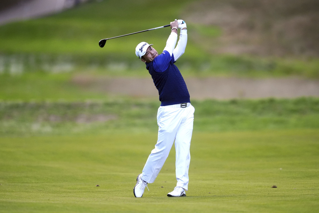 Japan's Hideki Matsuyama hits on the 17th hole during the second round of the BMW PGA Championship golf tournament, Friday, Sept. 12, 2025, at Wentworth Golf Club in Virginia Water, England. (Adam Davy/PA via AP)