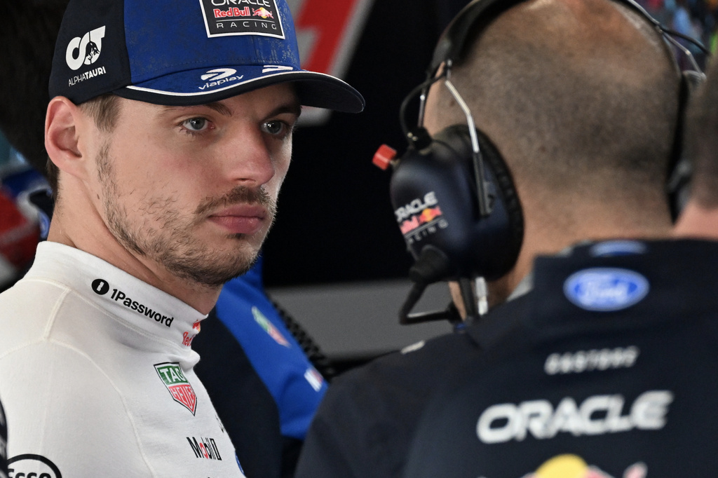 Red Bull driver Max Verstappen of the Netherlands, left, prepares for the qualifying session ahead of the British F1 Grand Prix, in Silverstone, England, Saturday, July 4, 2026. (Peter Powell/Pool via AP)