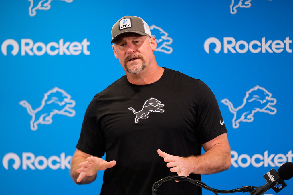 Detroit Lions head coach Dan Campbell talks to the media before practice at the NFL football team's training camp, in Allen Park, Mich., Thursday, July 30, 2026. (AP Photo/Paul Sancya)