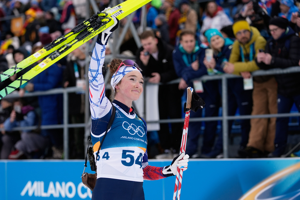 Lou Jeanmonnot, of France, gestures after the women's 15-kilometer individual biathlon race at the 2026 Winter Olympics in Anterselva, Italy, Wednesday, Feb. 11, 2026. (AP Photo/Andrew Medichini)