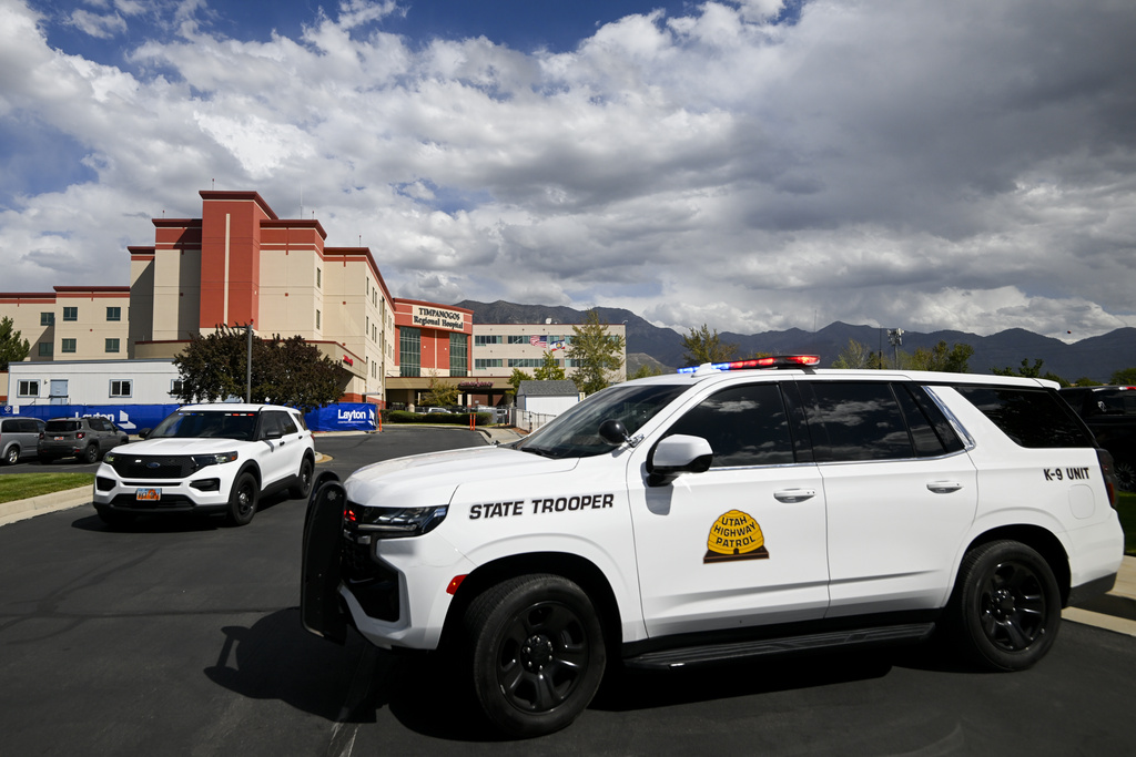 Utah Highway Patrol vehicles park outside Timpanogos Regional Hospital on Wednesday, Sept. 10, 2025, in Orem, Utah. (AP Photo/Alex Goodlett)