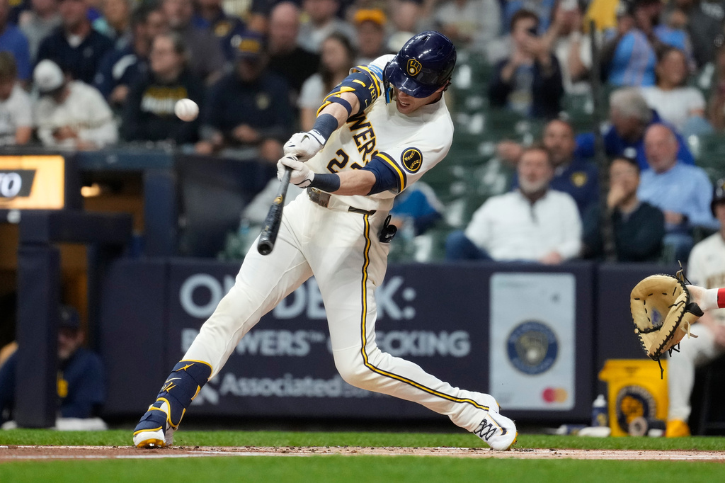 Milwaukee Brewers' Christian Yelich hits a solo home run during the first inning of a baseball game against the Cleveland Guardians, Wednesday, June 17, 2026, in Milwaukee. (AP Photo/Aaron Gash)