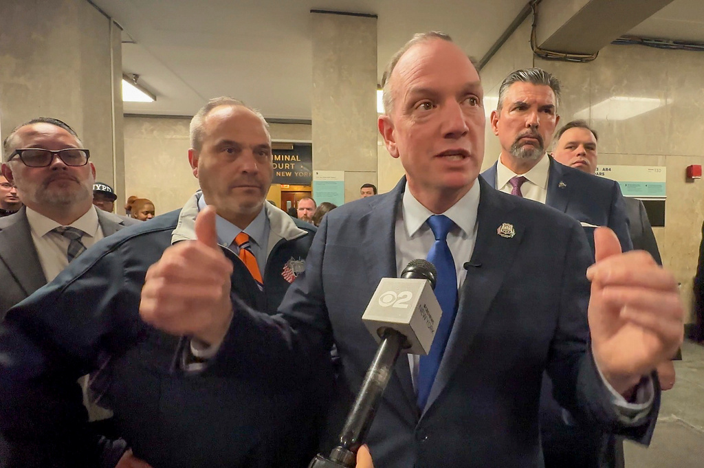 Police Benevolent Association President Patrick Hendry speaks to reporters after an initial court appearance for a man suspected of throwing snowballs at police officers. Thursday, Feb. 26, 2026, in New York. (AP Photo/Michael Sisak)