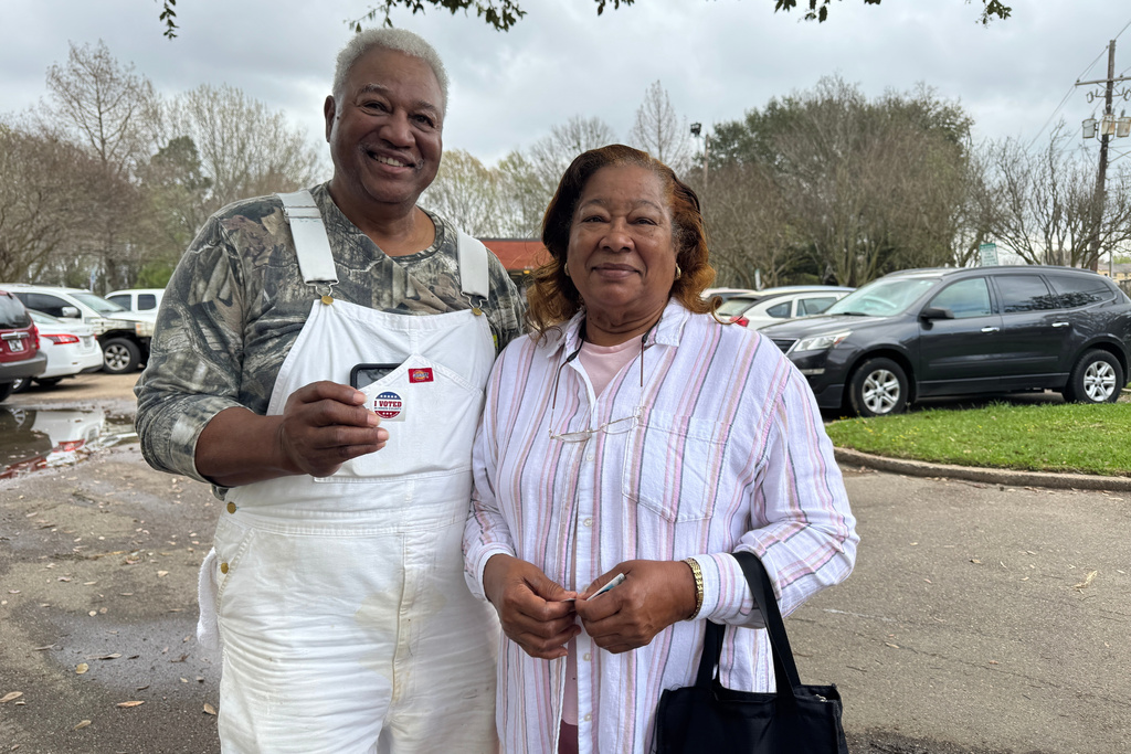 George B. Jones, left, and Jessie Ree Jones pose for a portrait after casting their votes in Mississippi's Democratic primary on Tuesday, March 10, 2026, in Jackson, Miss. (AP Photo/Sophie Bates)