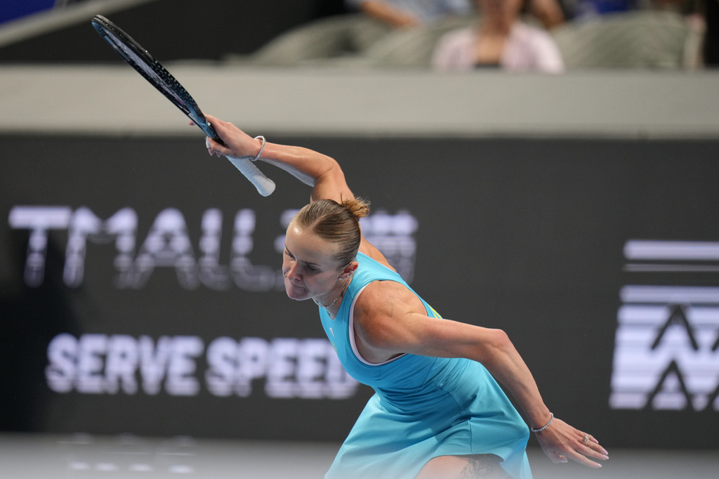 Elina Svitolina of Ukraine celebrates winning her match against Jasmine Paolini of Italy in the Billie Jean King Cup women's singles semifinal between Ukraine and Italy, in Shenzhen, China, Saturday, Sept. 26, 2026. (AP Photo/Andy Wong)