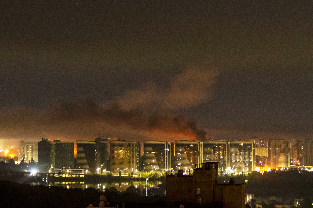 Smoke rises over the city center of Kyiv, Ukraine, after a Russian missile attack Saturday, Aug. 1, 2026. (AP Photo/Dan Bashakov)