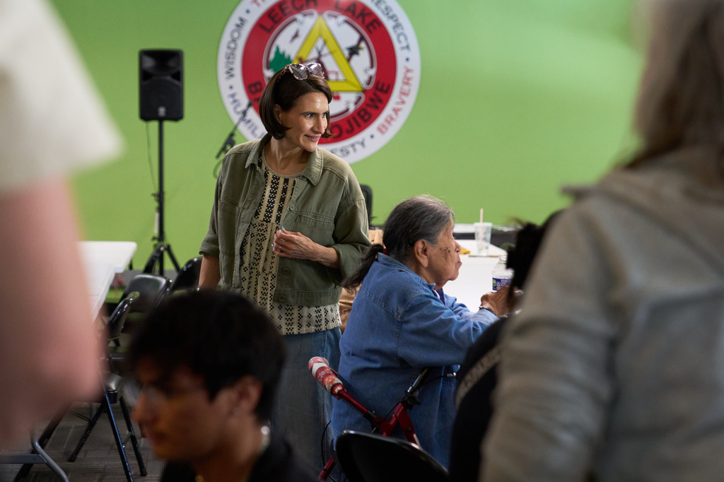 Minnesota Lt. Gov. Peggy Flanagan, a Democratic candidate for U.S. Senate, greets supporters during a campaign event at the Leech Lake Band of Ojibwe Twin Cities Office in Minneapolis, Saturday, Aug. 8, 2026. (AP Photo/Ellen Schmidt)