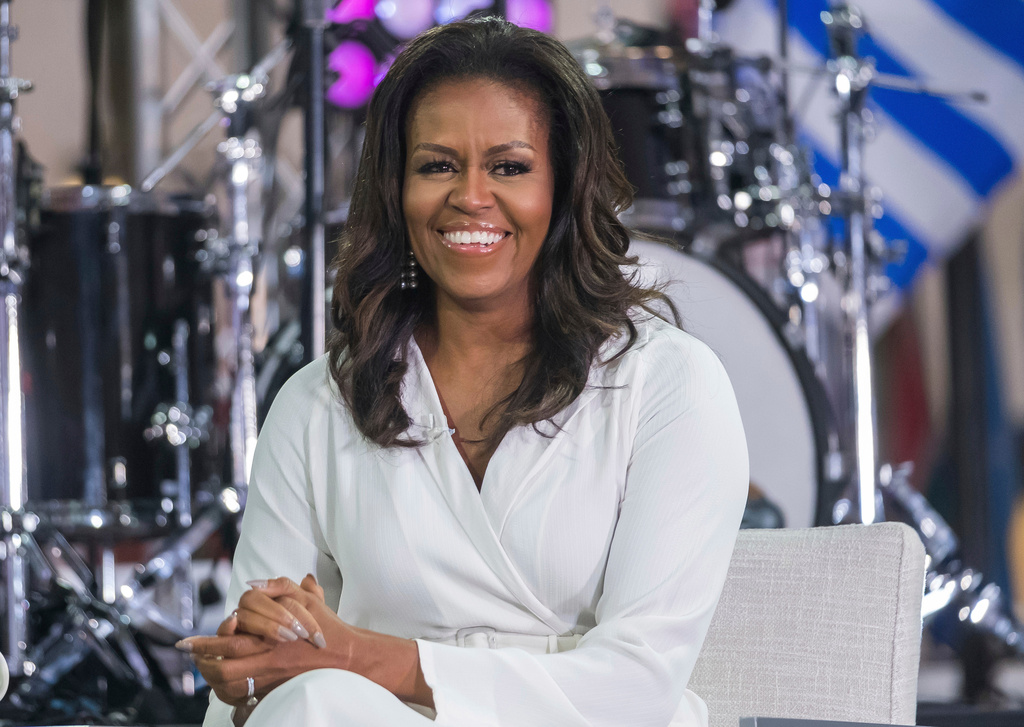 FILE - In this Oct. 11, 2018, file photo, Michelle Obama participates in the International Day of the Girl on NBC's "Today" show in New York. (Photo by Charles Sykes/Invision/AP, File)