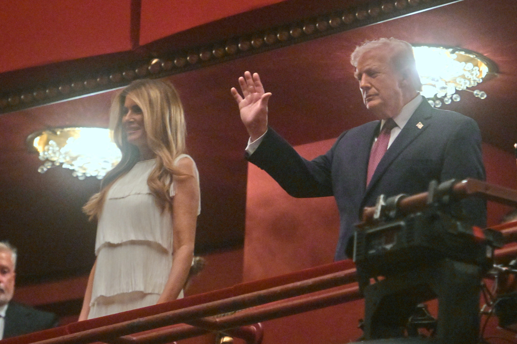 President Donald Trump and first lady Melania Trump arrive to attend the opening nights of the musical "Chicago" at the John F. Kennedy Center for the Performing Arts in Washington, Tuesday, March 31, 2026. (AP Photo/Rod Lamkey, Jr.)