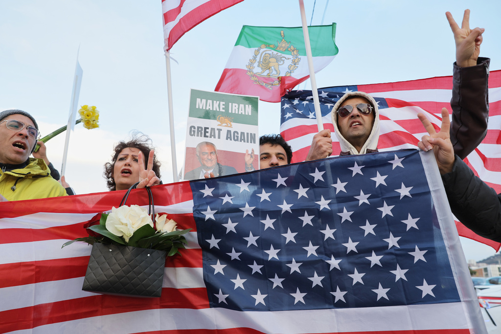 Demonstrators from the Iranian diaspora and Georgian opposition activists attend a rally outside the U.S. Embassy in Tbilisi, Georgia, Wednesday, March 4, 2026, in reaction to the U.S. and Israeli military action against Iran. (AP Photo/Zurab Tsertsvadze)