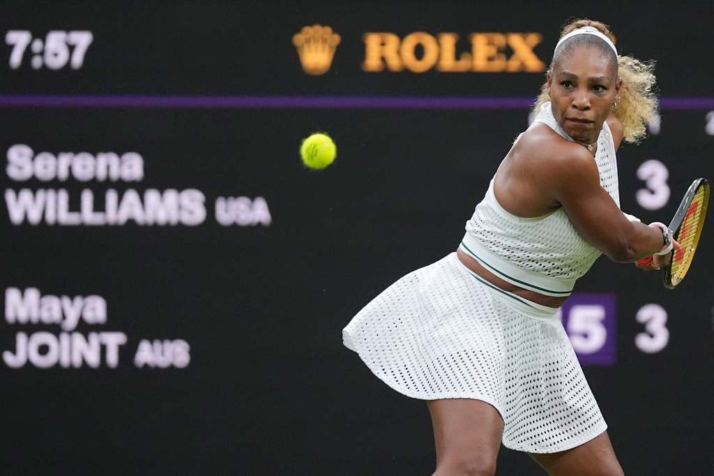 Serena Williams of the United States plays a backhand against Maya Joint of Australia in their first round women's singles match at the Wimbledon Tennis Championships in London, Tuesday, June 30, 2026. (AP Photo/Maja Smiejkowska)