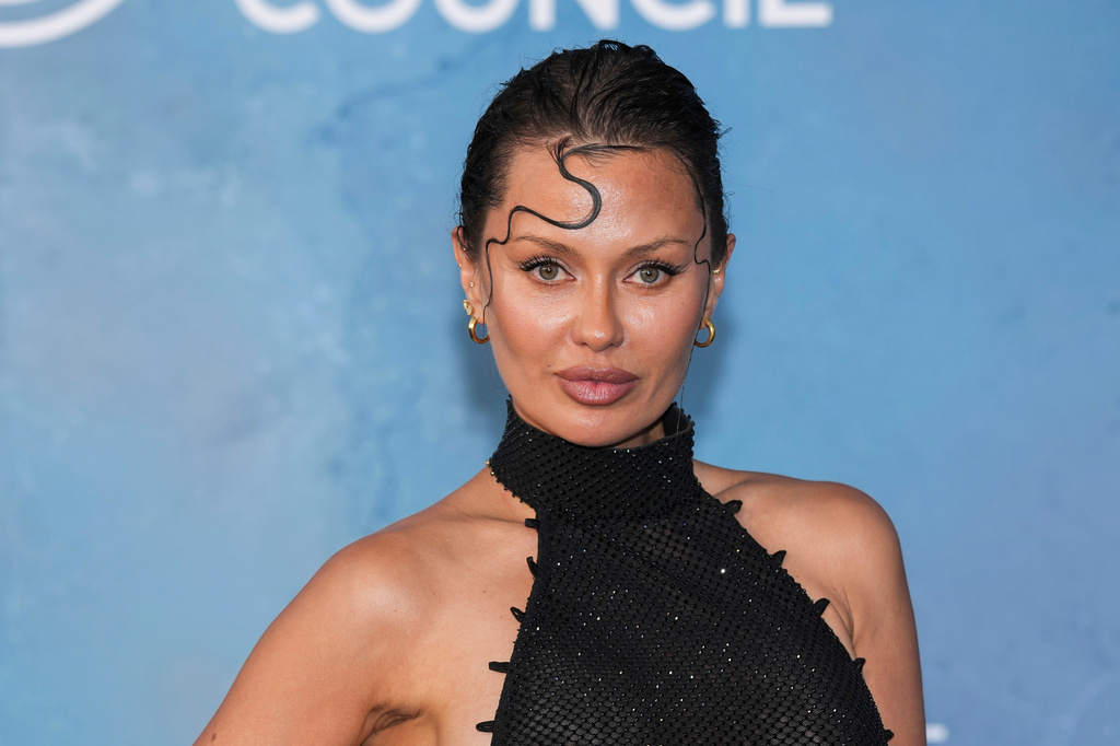 FILE - Victoria Bonya poses for photographers upon arrival at the amfAR gala at the Arsenale di Venezia, in Venice, Italy, on Sunday, Aug. 31, 2025. (Photo by Scott A Garfitt/Invision/AP, File)