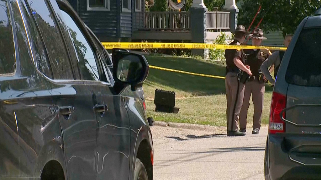 This image taken from video provided by WQAD, police investigate the fatal shootings of several people in Muscatine, Iowa on Monday, June 1, 2026. (WQAD via AP)